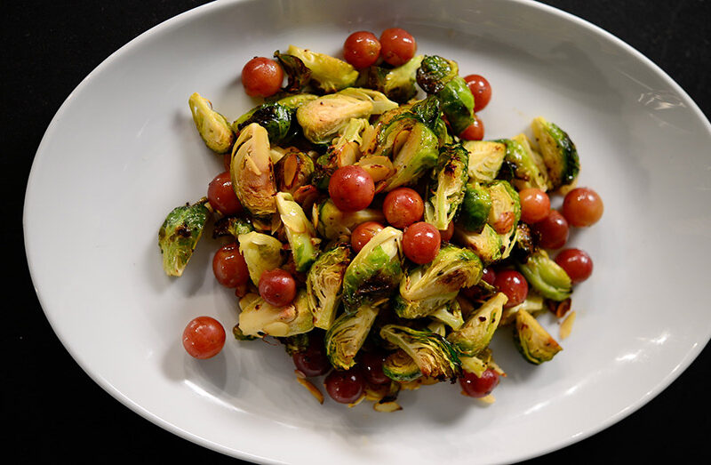 Roasted Brussels Sprouts and Red Grapes with Almonds and Balsamic Chili Dressing