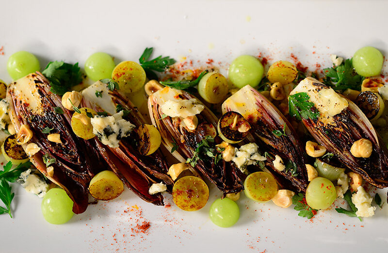 Charred Grape and Endive Salad with Roquefort, Hazelnuts and Black Pepper Honey