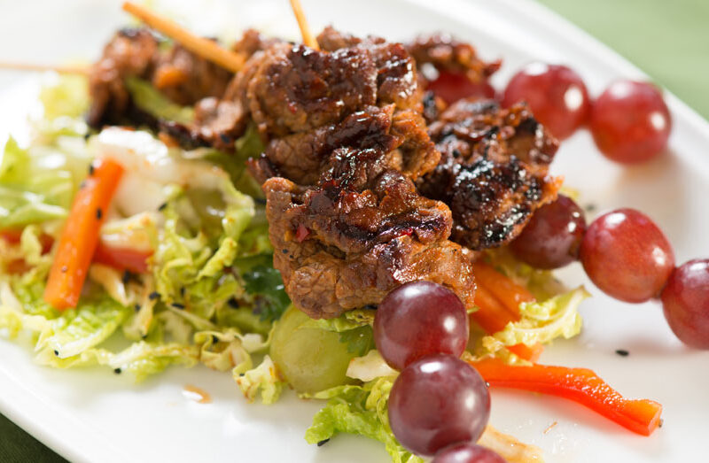 Korean Barbecue-Spiced Flank Steak and Red Grape Skewers with Green Grape Slaw