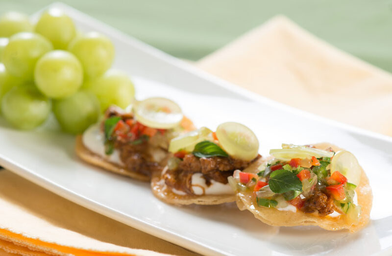 Mini Tostadas with Ancho Chile Chicken and Spicy Green Grape Salsa