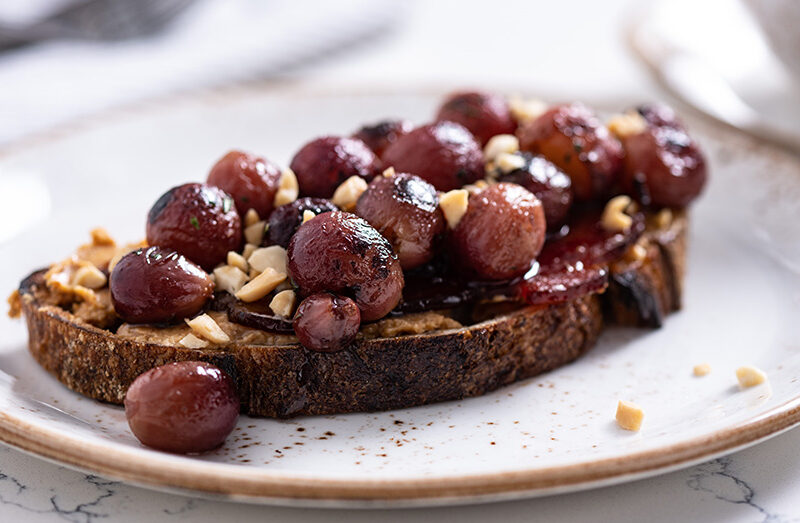 Peanut Butter Toast with Maple-Pepper Bacon and Caramelized Red Grapes