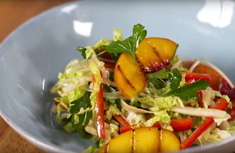 Grilled Peach Slaw with Aleppo Spiced Almonds and Smoked Peach Vinaigrette